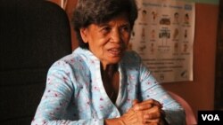 Svay Simorn, who is a widow and a social worker, tells VOA Khmer that she has been discriminated for more than 30 years for having a mentally disabled daughter and grandson. (Oum Sonita/VOA Khmer)