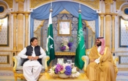 FILE - Pakistan's Prime Minister Imran Khan meets with Saudi Arabia's Crown Prince Mohammed bin Salman, in Jeddah, Saudi Arabia, Sept. 19, 2019.