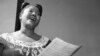 Mahalia Jackson, "Queen of the Gospel Singers," practices a new song in her Chicago apartment, Aug. 30, 1955. 