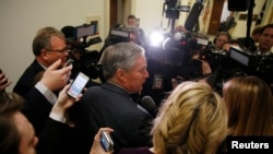 House Freedom Caucus Chairman Rep. Mark Meadows (R-NC) is surrounded by reporters and television cameras as he arrives at a caucus meeting after a trip to the White House to meet with President Donald Trump about the AHCA health care bill in Washington, March 23, 2017. 
