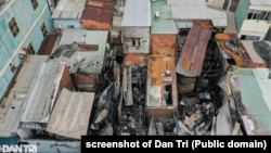 Dân Trí đưa tin về vụ 7 căn nhà bị lửa thiêu rụi trên đường Trần Đình Xu, quận 1, Tp.HCM, 28/1/2025.