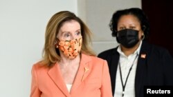 FILE - U.S. House Speaker Nancy Pelosi departs a news conference on Capitol Hill in Washington, Oct. 8, 2020. 