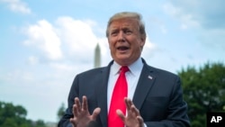 President Donald Trump speaks to reporters on the South Lawn before leaving the White House in Washington, May 20, 2019.