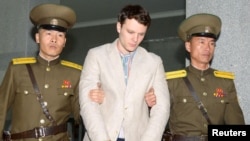  FILE - Otto Frederick Warmbier, a University of Virginia student, has been detained in North Korea since early January, is taken to North Korea's top court in Pyongyang, North Korea, March 16, 2016.