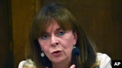 In this Monday, Oct. 14, 2019 photo, Council of State head Katerina Sakellaropoulou speaks during a panel discussion in Athens.