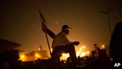 Supporters of Egypt's ousted President Mohammed Morsi on a barricade in Nasr City, Cairo, Aug. 2, 2013. 