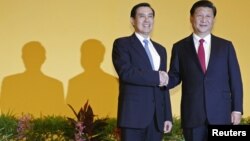 A woman attends Christmas Mass at St. Alexander Nevski cathedral in Sofia, Bulgaria.