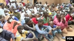 FILE - 40 of the 57 men who surrendered recently were former Boko Haram fighters, in Meri, Cameroon, July 29, 2021.(Moki Edwin Kindzeka/VOA)