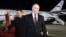 FILE - Russian President Vladimir Putin, right, walks as North Korea's leader Kim Jong Un shakes hands with the Russian delegation during their meeting at the Pyongyang Sunan International Airport outside Pyongyang, North Korea, early Wednesday, June 19, 2024.