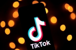 This photo taken on Nov. 21, 2019, shows the logo of the social media video sharing app Tiktok displayed on a tablet screen.