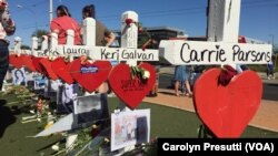 The crosses, erected in a graceful, curvy line behind the “Welcome to Las Vegas” sign, serve as markers of the lives of those who died when a gunman opened fire Oct. 1, 2017, at the crowd attending a country music concert in Las Vegas. Many visitors leave behind flowers or tokens as memories. 