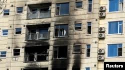 FILE - A hotel building is damaged in an attack by Islamic State-Khorasan, in Kabul, Afghanistan, Dec. 13, 2022.