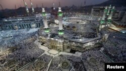 Muslim pilgrims pray around the holy Kaaba, originally built by the Prophet Abraham and his son Ismail, at the Grand Mosque, during the annual Hajj pilgrimage in Mecca, Saudi Arabia, Sept. 27, 2014.