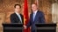Vietnamese Prime Minister Nguyen Tan Dung, left, and New Zealand Prime Minister John Key shake hands after a signing of agreements at the Government House pavilion in Auckland, New Zealand, Thursday March 19, 2015.