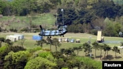 A Terminal High Altitude Area Defense (THAAD) interceptor (right) is seen in Seongju, South Korea, April 26, 2017. 