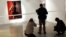 The controversial portrait of South African President Jacob Zuma painted by Brett Murray stands defaced at the Goodman Gallery in Johannesburg, South Africa.
