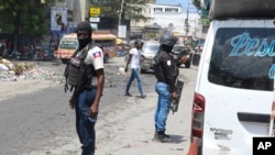 National Police patrol an intersection amid gang violence in Port-au-Prince, Haiti, April 8, 2024.