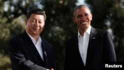 U.S. President Barack Obama meets Chinese President Xi Jinping at The Annenberg Retreat at Sunnylands in Rancho Mirage, California, June 7, 2013.
