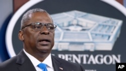 FILE - Defense Secretary Lloyd Austin speaks at a press briefing at the Pentagon in Arlington, Va., July 21, 2021.