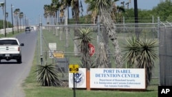 A U.S. Border Patrol truck enters the Port Isabel Detention Center, which holds detainees of U.S. Immigration and Customs Enforcement, June 26, 2018, in Los Fresnos, Texas.