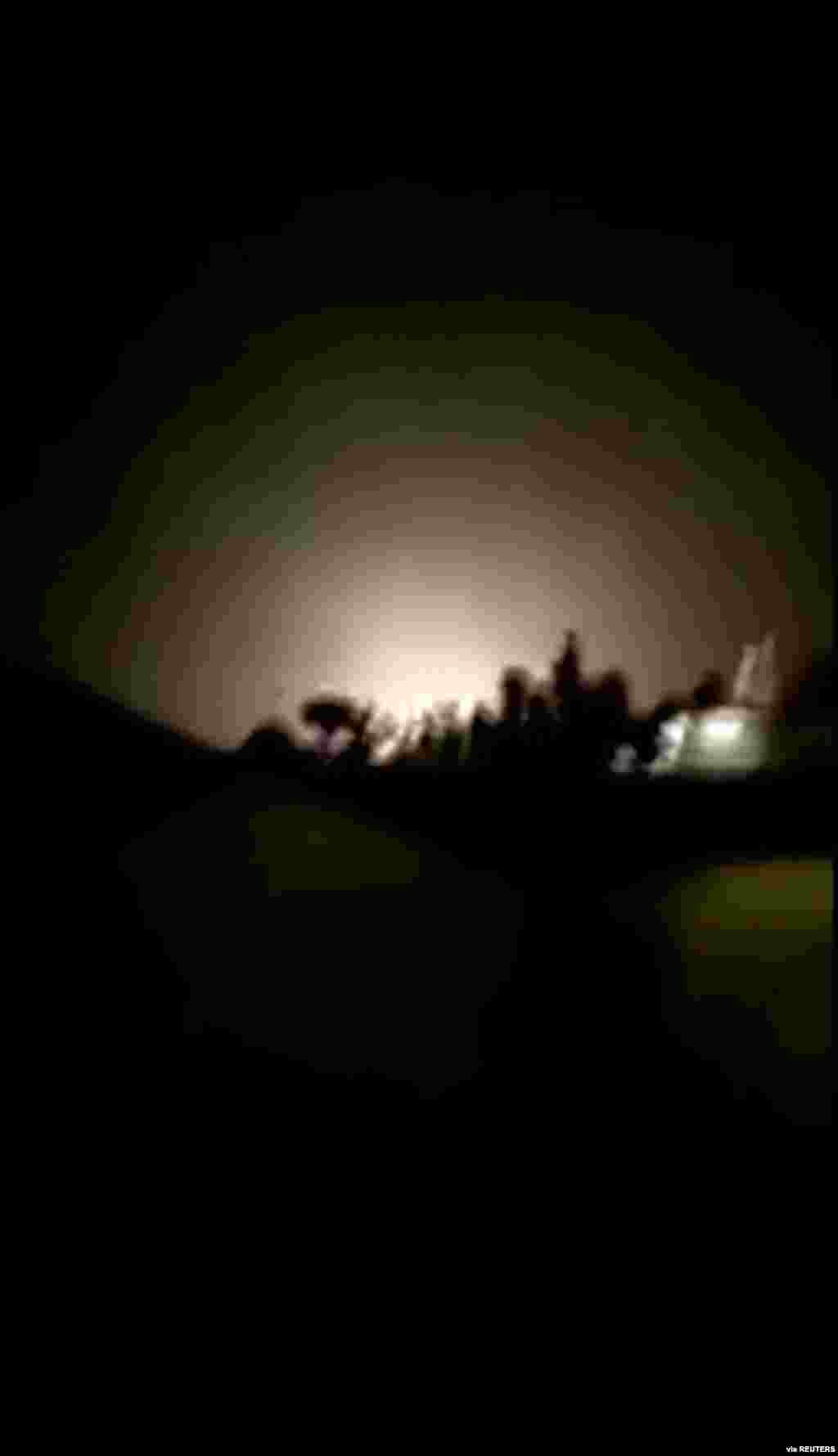 An explosion is seen following missiles landing at what is believed to be Ain al-Asad Air Base in Iraq, in this still image taken from a video from state-run Iran Press on Jan. 8, 2020.