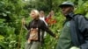 FILE - Dominique Bavukahe-Manir, chief inspector of the Jomba area at the National Park of Virunga in the DRC accompanies tourists to observe gorillas.