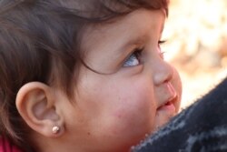 Nearly 1 million people have been displaced from the battles in Idlib, Syria, since December. More than half are children. Manbij, Syria, Feb. 20, 2020. (Heather Murdock/VOA)