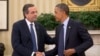 President Barack Obama shakes hands with Greek Prime Minister Antonis Samaras during their meeting in the Oval Office of the White House in Washington, Aug. 8, 2013. 
