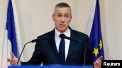 FILE - Prosecutor Francois Molins speaks to reporters in Paris after it was learned that French national Maxime Hauchard was among Islamic State members filmed as they executed Syrian soldiers, Nov. 17, 2014.