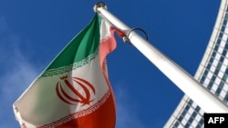 FILE - The Iranian national flag is seen in Vienna, March 1, 2021. 