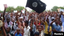 FILE - Pro Al-Shabaab demonstrators attend a protest in Somalia.