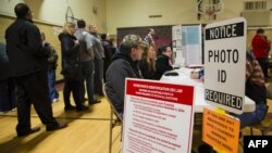 Voters take to the polls in Wauwatosa, Wis., April 5, 2016. Republicans and Democrats both cast their votes in Tuesday's presidential primaries. 