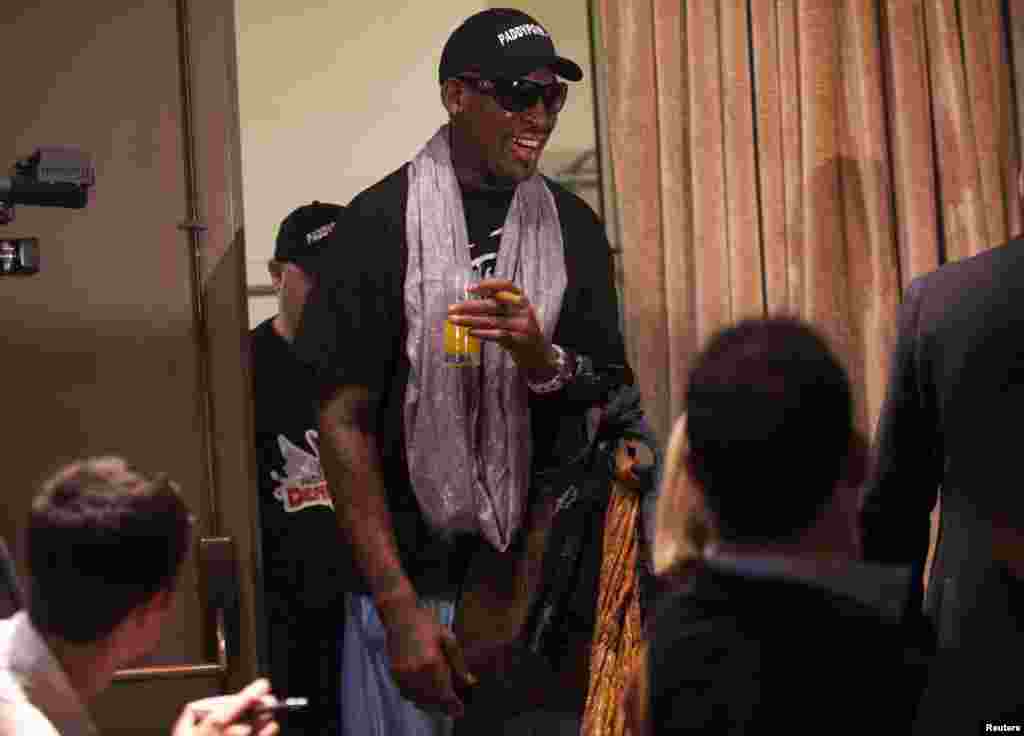 Dennis Rodman arrives for a news conference in New York, Sept. 9, 2013.