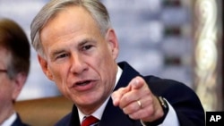 FILE - Texas Gov. Greg Abbott speaks in the House Chamber in Austin, Texas, Feb. 5, 2019.