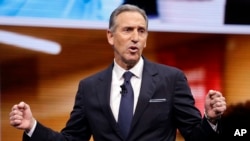 FILE - Howard Schultz, CEO of Starbucks at the time, speaks at the Starbucks annual shareholders meeting in Seattle, Washington, March 22, 2017.