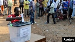 FILE - A man casts his vote at a polling station during presidential elections in Accra, Dec. 7, 2012. Presidential candidate Hassan Ayariga says he is confident Ghanaians embrace his plans to transform the lives of citizens across the country.
