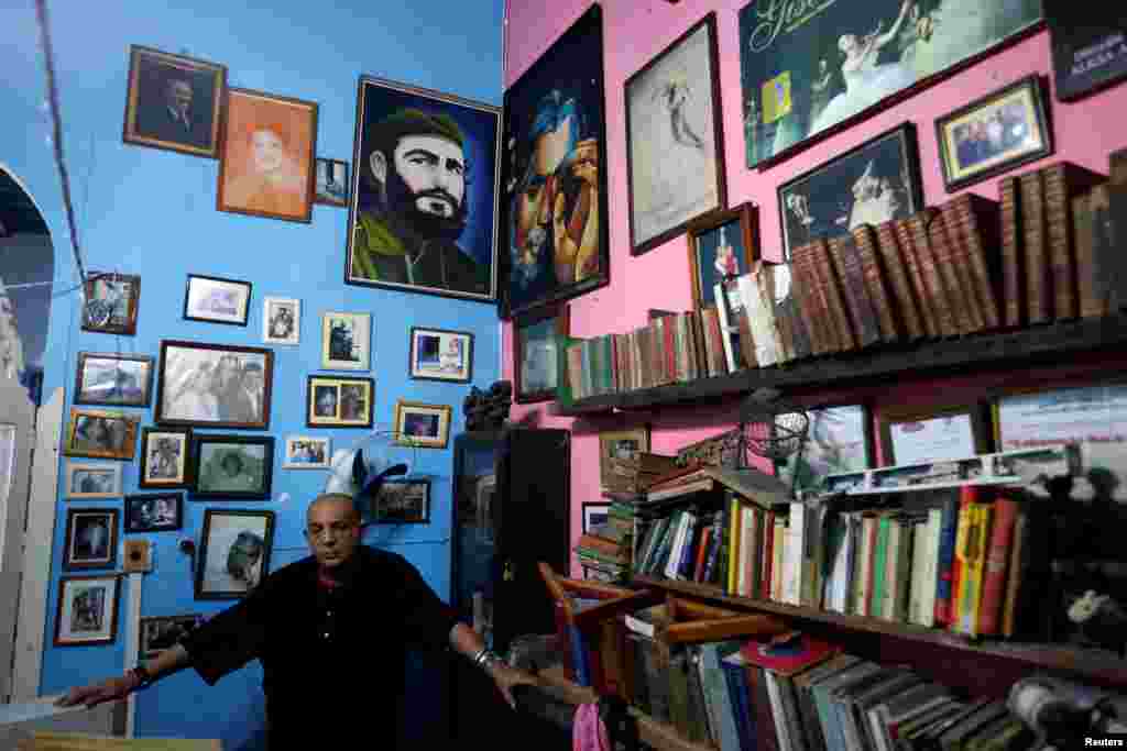 A man poses for a picture after the death of Cuba's former President Fidel Castro was announced in Havana, Cuba, November 26, 2016.