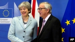 Тереза Мей і Жан-Клод Юнкер