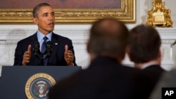 President Barack Obama speaks to members of the National Governors Association in the State Dining Room of the White House in Washington, Feb. 24, 2014.
