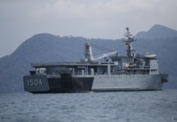 FILE - A Malaysian navy vessel patrols waters near Langkawi Island, May 16, 2015. Malaysia is buying four ships from China to help it patrol its coastline.