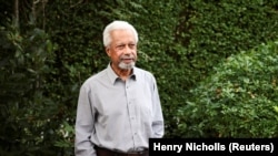 Tanzanian novelist Abdulrazak Gurnah who won the 2021 Noble Prize in Literature, poses for the media at his home in Kent, Britain, October 7, 2021.(REUTERS/Henry Nicholls)