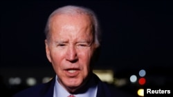 U.S. President Joe Biden speaks to reporters before boarding Air Force One at Naval Station Norfolk in Norfolk, Virginia, U.S., Nov. 19, 2023.