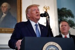 President Donald Trump speaks in the Diplomatic Room of the White House in Washington, Oct. 23, 2019.