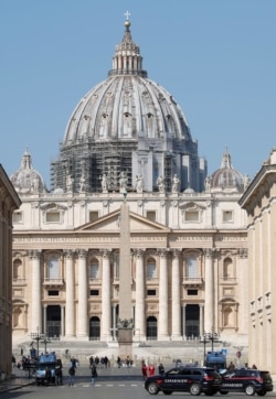Carabinieri military police patrol Saint Peter's square at the Vatican April 5, 2020, before Pope Francis leads Palm Sunday Mass without public participation due to the spread of coronavirus disease.