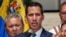Opposition leader Juan Guaido, who has declared himself the interim president of Venezuela, speaks during a press conference on the steps of the National Assembly in Caracas, Feb. 4, 2019.