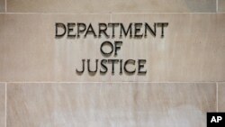 FILE - Robert F. Kennedy Department of Justice Building.