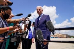 President Joe Biden speaks to members of the media before boarding Air Force One for a trip to Cleveland, May 27, 2021, in Andrews Air Force Base, Md.
