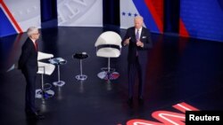 U.S. President Joe Biden participates in a town hall about his infrastructure investment proposals with CNN's Anderson Cooper at the Baltimore Center Stage Pearlstone Theater in Baltimore, Maryland, U.S. Oct. 21, 2021.