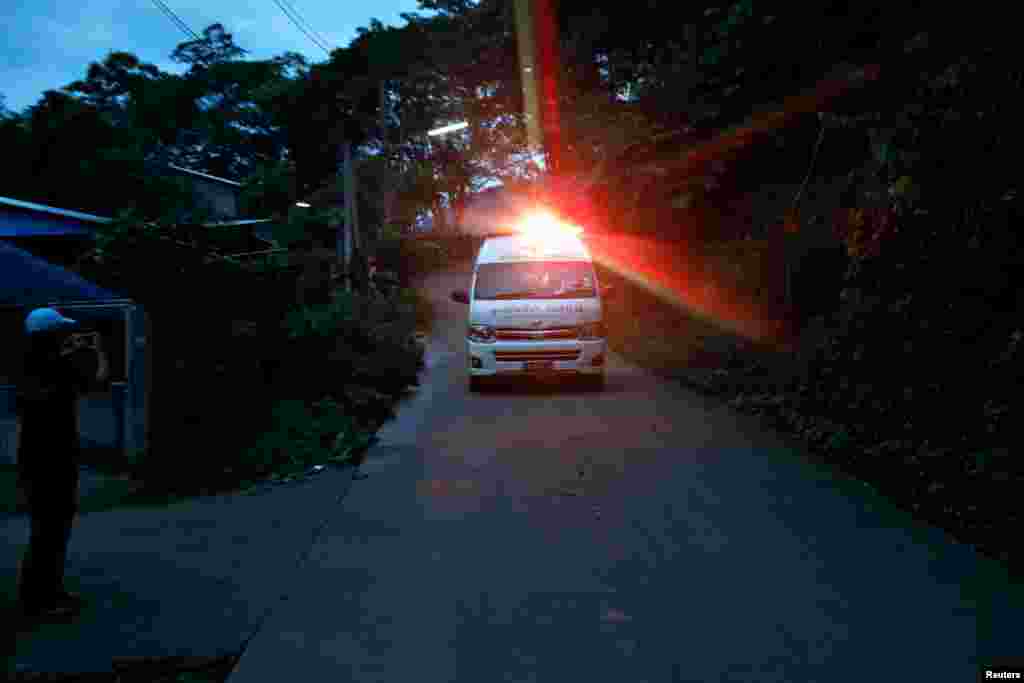 An ambulance believed to be carrying rescued schoolboys travels to a military helipad near Tham Luang cave complex in the northern province of Chiang Rai, Thailand, July 8, 2018.