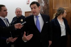 Sen. Marco Rubio, R-Fla., speaks to media on Capitol Hill in Washington, March, 12, 2020, as he arrives for a briefing on the coronavirus outbreak.
